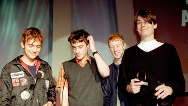Blur accept the best album award at the 1994 Q Awards